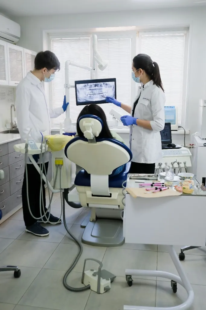 Dentist treating a patient at Palm Dental Sarasota