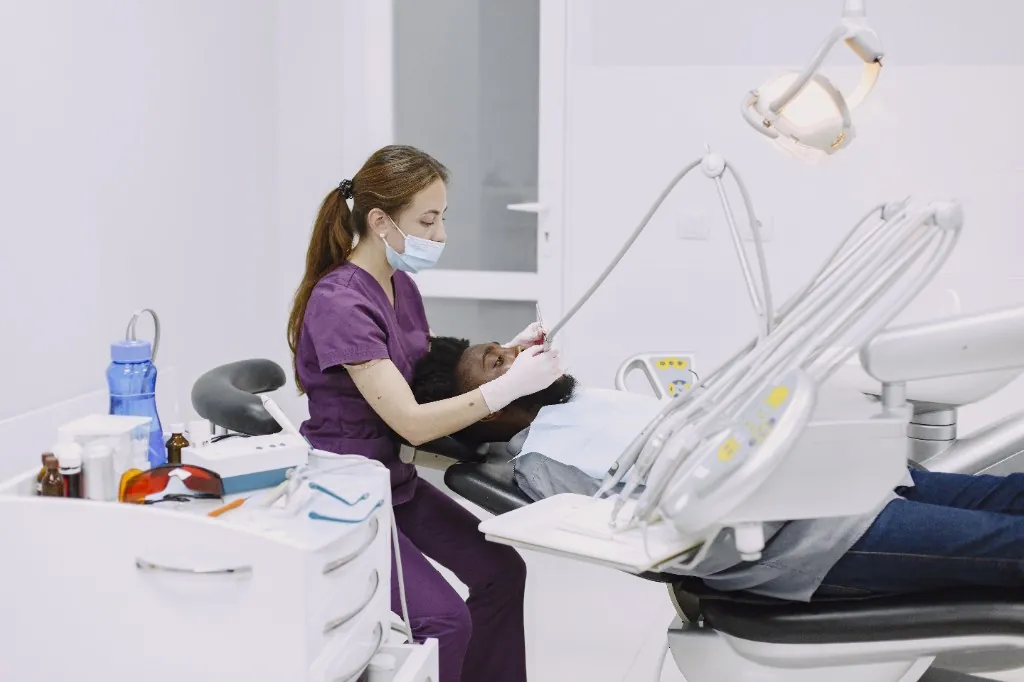 Modern dental clinic with dentist and patient
